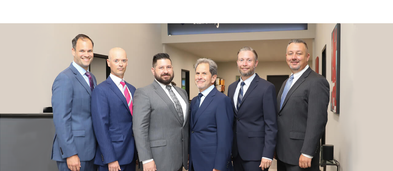 Photo of attorneys at Reich, Jumbeck, Stole & Reeb, LLP